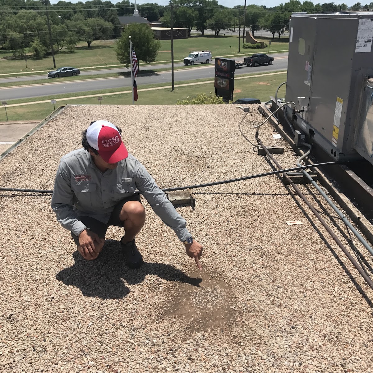 Jason Boatman inspecting a roof in Abilene, TX